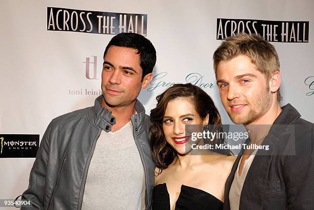 Actors Danny Pino, Brittany Murphy and Mike Vogel arrive at the premiere of "Across The Hall" on December 1, 2009 in Beverly Hills, California.
