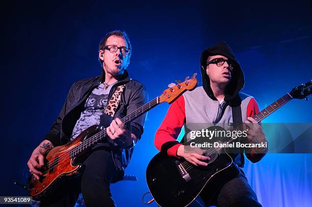 Scott Shriner and Rivers Cuomo of Weezer perform at the Aragon Ballroom on December 1, 2009 in Chicago, Illinois.