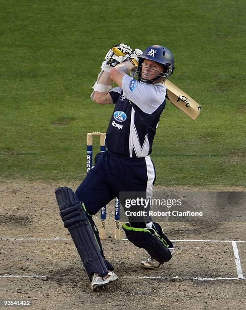 Chris Rogers of Victoria hits out during the Ford Ranger Cup match between the Victorian Bushrangers and the Queensland Bulls at Melbourne Cricket...