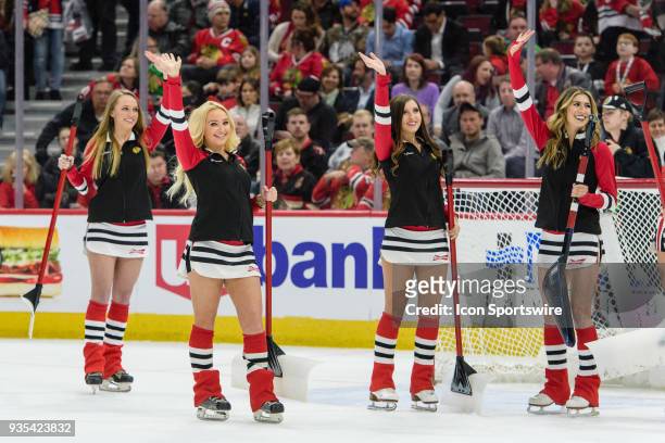 Chicago Blackhawks Ice Crew members clean the ice in the 1st period during an NHL hockey game between the Colorado Avalanche and the Chicago...