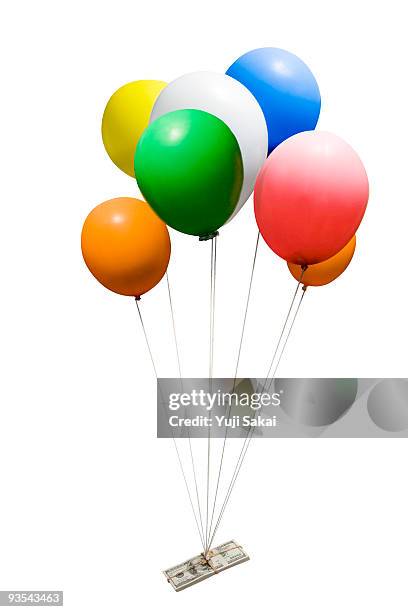 balloon lift dollar  - bundle stock pictures, royalty-free photos & images