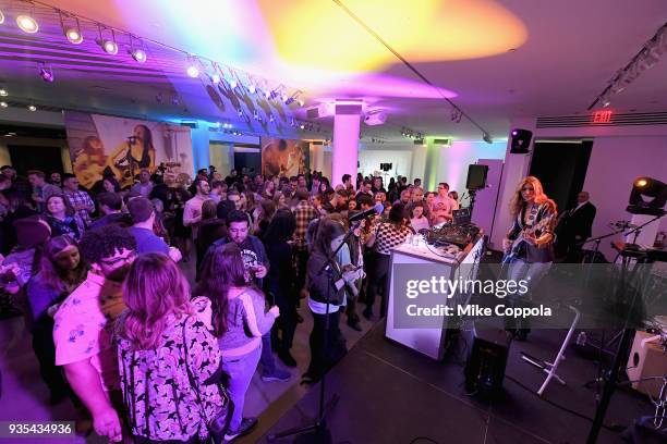 And Bassist Blu DeTiger performs during the Fenders California Series Acoustics launch party at Milk Studios on March 20, 2018 in New York City.