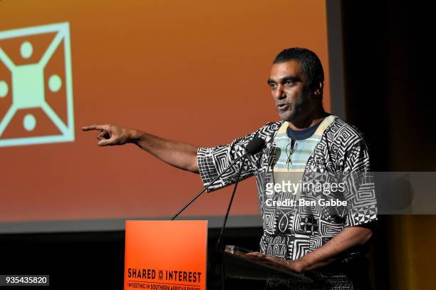 Incoming Amnesty International Secretary-General Kumi Naidoo accepts an award onstage during the Shared Interest 2018 Annual Spring Benefit at the...