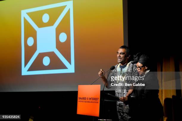 Incoming Amnesty International Secretary-General Kumi Naidoo accepts an award onstage during the Shared Interest 2018 Annual Spring Benefit at the...