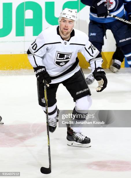 Tanner Pearson of the Los Angeles Kings follows the play down the ice during second period action against the Winnipeg Jets at the Bell MTS Place on...