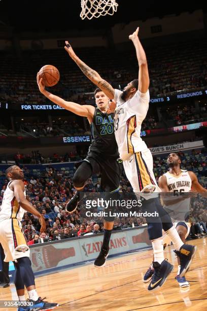 Doug McDermott of the Dallas Mavericks handles the ball against the New Orleans Pelicans on March 20, 2018 at the Smoothie King Center in New...