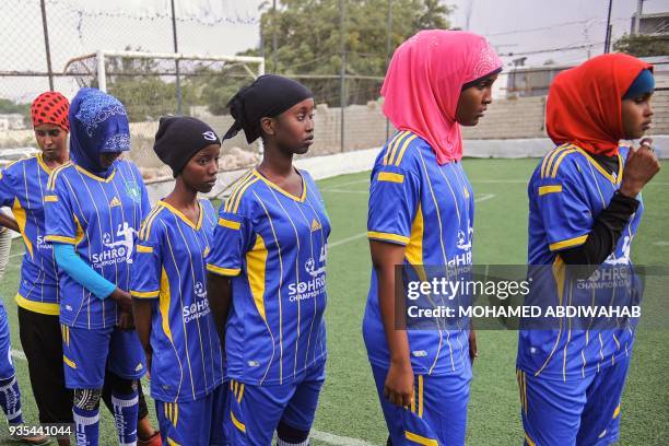 Somali football players of Golden Girls Football Centre, Somalia's first female soccer club, attend their training session at Toyo stadium in...