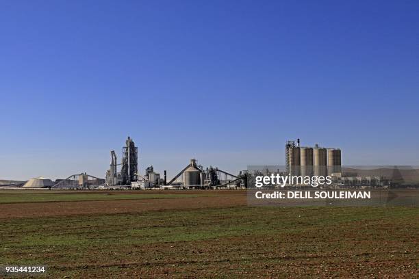 General view shows the Lafarge Cement Syria cement plant in Jalabiya, some 30 kms from Ain Issa, in northern Syria, in February 19, 2018. The choice...