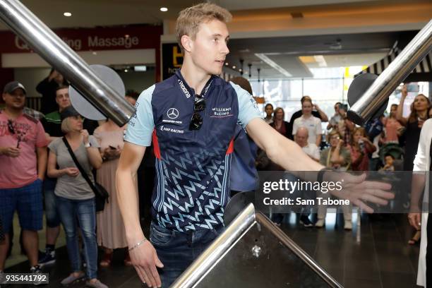 Sergey Sirotka testing his reflexes at the Williams F1 team meet and greet on March 21, 2018 in Melbourne, Australia.