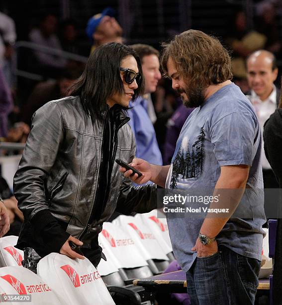 Jack Black talks to Taboo of the Black Eyed Peas at the game between the New Orleans Hornets and the Los Angeles Lakers at Staples Center on December...