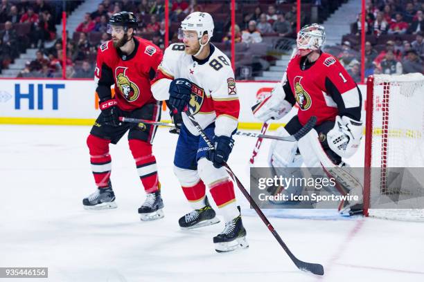 Florida Panthers Left Wing Jamie McGinn sets up next to the Ottawa net during third period National Hockey League action between the Florida Panthers...