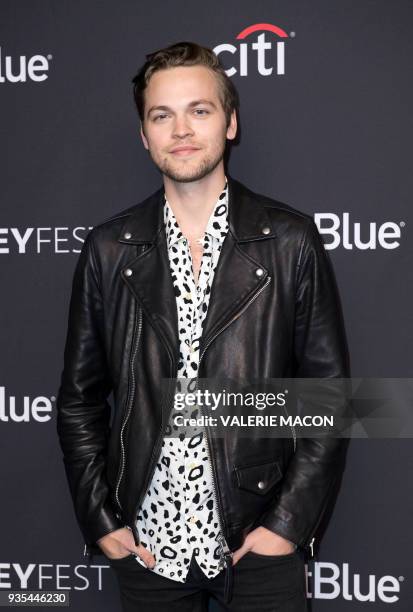 Actor Alexander Calvert attends The 2018 PaleyFest screening of CW's Supernatural at the Dolby Theater on March 20 in Hollywood, California. / AFP...