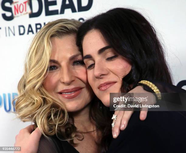 Actress Tatum O'Neal and daughter Emily McEnroe attend the "God's Not Dead: A Light in Darkness" premiere at American Cinematheque's Egyptian Theatre...