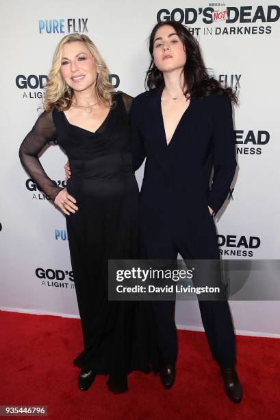 Actress Tatum O'Neal and daughter Emily McEnroe attend the "God's Not Dead: A Light in Darkness" premiere at American Cinematheque's Egyptian Theatre...