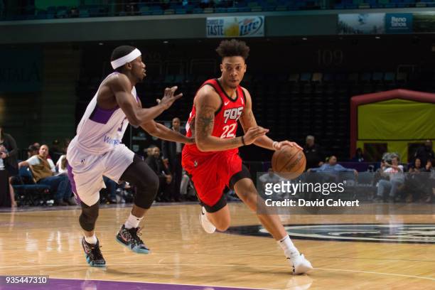 Malachi Richardson of Raptors 905 dribbles around defender Josh Hagins of the Reno Bighorns during an NBA G-League game on March 20, 2018 at the Reno...