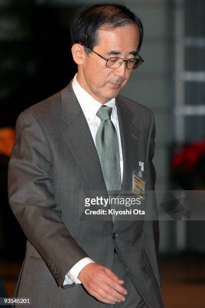 Bank of Japan Governor Masaaki Shirakawa arrives at Hatoyama's official residence to meet with Japanese Prime Minister Yukio Hatoyama for their...