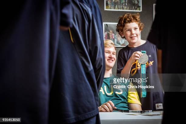Australian Winter Olympic athlete Jarryd Hughes is seen with students at Maribyrnong Sports Academy on March 21, 2018 in Melbourne, Australia....