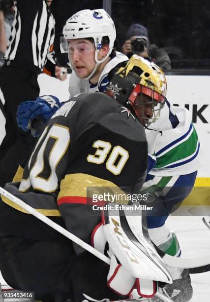Malcolm Subban of the Vegas Golden Knights blocks a shot by Reid Boucher of the Vancouver Canucks in the third period of their game at T-Mobile Arena...