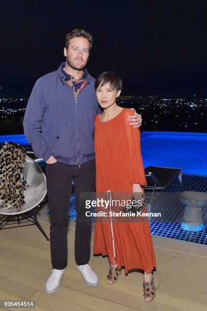 Armie Hammer and Jimmy Choo Creative Director Sandra Choi attend The Hollywood Reporter and Jimmy Choo Power Stylists Dinner on March 20, 2018 in Los...