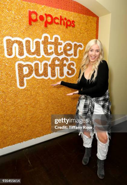 Influencer Lily Marston attends the launch of Popchips' Nutter Puffs at the Chateau Marmont on March 20, 2018 in Los Angeles, California.