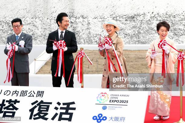 Masato Nakamura and Miwa Yoshida of Dreams Come True attend the reopening ceremony of the 'Tower of the Sun' at the Expo '70 Memorial Park on March...