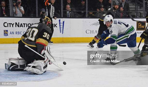 Malcolm Subban of the Vegas Golden Knights blocks a shot by Reid Boucher of the Vancouver Canucks in the third period of their game at T-Mobile Arena...