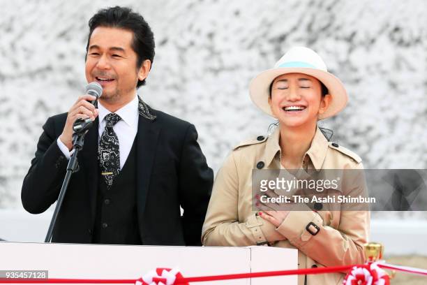 Masato Nakamura and Miwa Yoshida of Dreams Come True attend the reopening ceremony of the 'Tower of the Sun' at the Expo '70 Memorial Park on March...