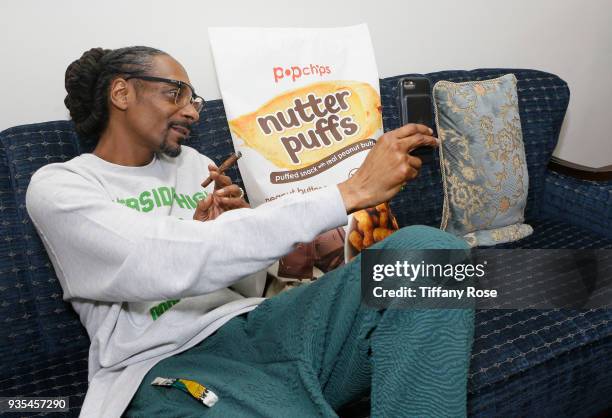 Snoop Dogg attends the launch of Popchips' Nutter Puffs at the Chateau Marmont on March 20, 2018 in Los Angeles, California.