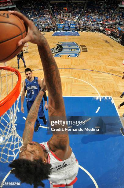 Lucas Nogueira of the Toronto Raptors dunks the ball against the Orlando Magic on March 20, 2018 at Amway Center in Orlando, Florida. NOTE TO USER:...