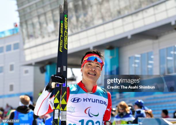 Yoshihiro Nitta of Japan celebrates winning the gold medal in the Cross Country Men's 10km Classic - Standing on day eight of the PyeongChang 2018...