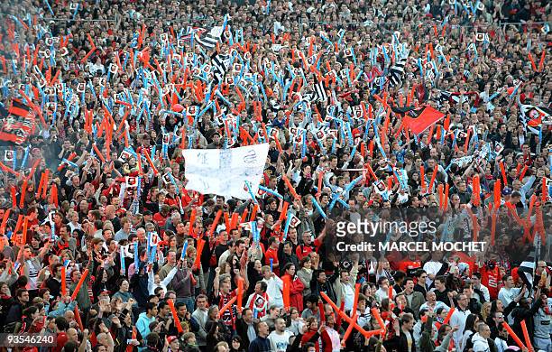 Around 20.000 supporters of the French L1 football club Stade Rennais are gathered on May 9, 2009 in Rennes, western France, as they watch on a giant...