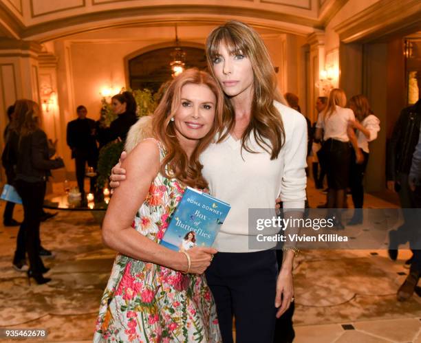 Roma Downey and Jennifer Flavin Stallone attend "Box of Butterflies" Book Party on March 20, 2018 in Beverly Hills, California.