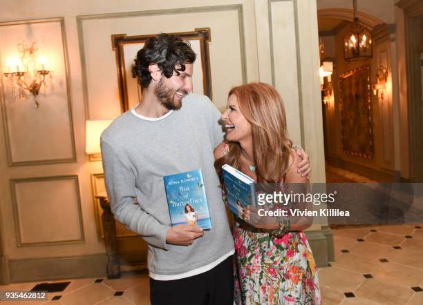 James Burnett and Roma Downey attend the "Box of Butterflies" Book Party on March 20, 2018 in Beverly Hills, California.