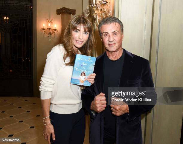 Jennifer Flavin Stallone and Sylvester Stallone attend "Box of Butterflies" Book Party on March 20, 2018 in Beverly Hills, California.