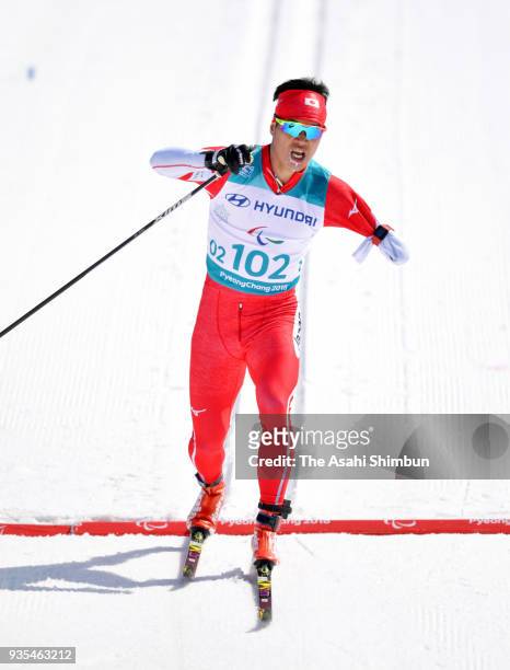 Yoshihiro Nitta of Japan crosses the finish line to win the gold medal in the Cross Country Men's 10km Classic - Standing on day eight of the...