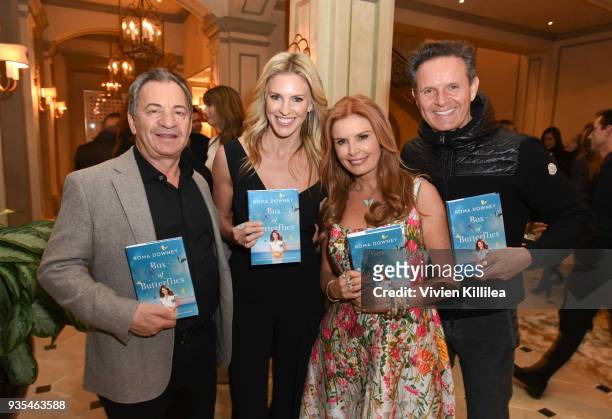 Kelly Gores, Alec Gores, Roma Downey and Mark Burnett attend the "Box of Butterflies" Book Party on March 20, 2018 in Beverly Hills, California.