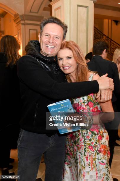 Roma Downey and Mark Burnett attend the "Box of Butterflies" Book Party on March 20, 2018 in Beverly Hills, California.