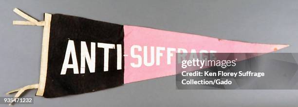 Black and pink pennant or banner, with the message "ANTI-SUFFRAGE" in white, likely produced for the American market, 1900. Photography by Emilia van...