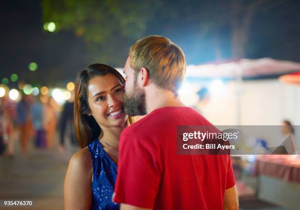 romance at the night market - hot latin nights stock pictures, royalty-free photos & images