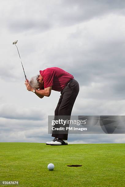 golfer missed a putt - golfer putting stock pictures, royalty-free photos & images