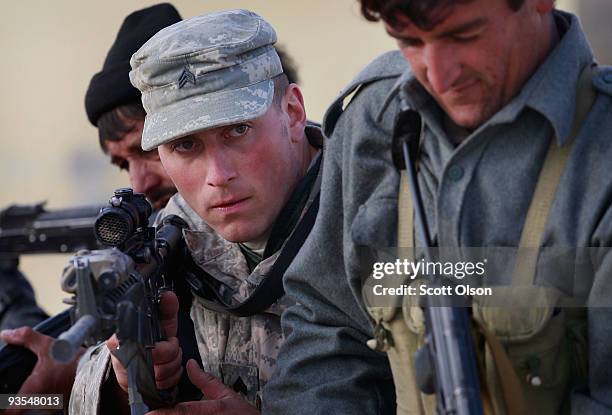 Joseph Delair of Syracuse, NY with the Army's Blackfoot Company 1st Battalion 501st Parachute Infantry Regiment trains Afghan National Policemen at...