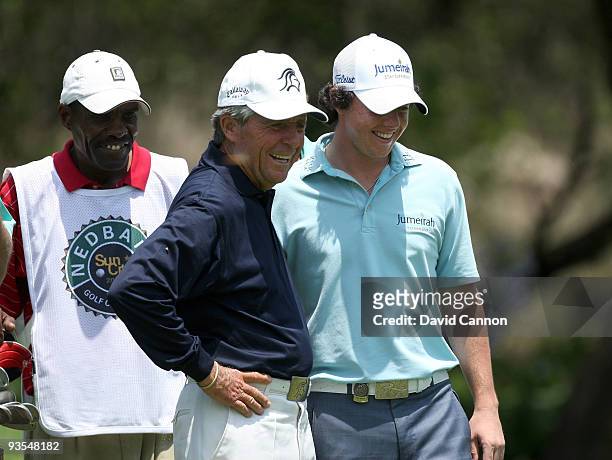 Rory McIlroy of Northern Ireland enjoys his time with South African Golf Legend Gary Player on the 16th tee during the pro-am as a preview for the...
