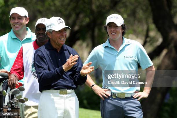 Rory McIlroy of Northern Ireland enjoys his time with South African Golf Legend Gary Player on the 16th tee during the pro-am as a preview for the...