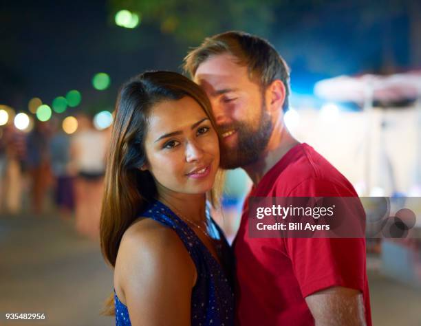 romance at the night market - hot latin nights stock pictures, royalty-free photos & images