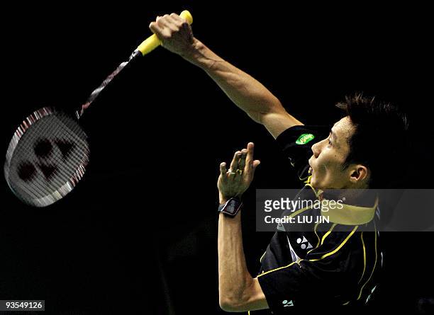 Malaysia's Lee Chong Wei returns a shot against Jang Young Soo of Korea during their preliminary match of Sudirman Cup World Team Badminton...