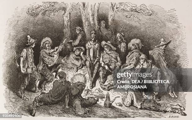 Don Quixote and Sancho Panza are invited to share the meal with a group of goat herders, engraving by Gustave Dore from Don Quixote of La Mancha by...