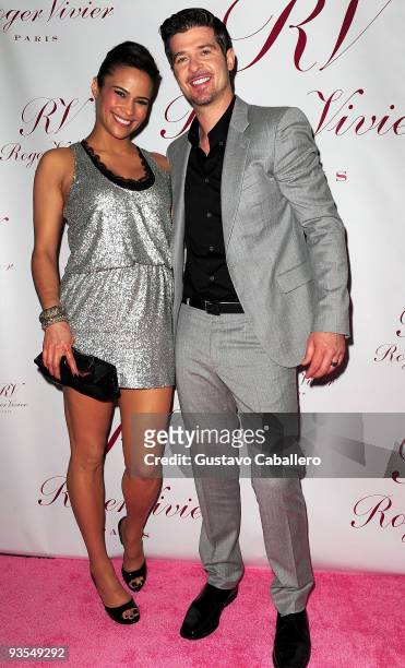 Paula Patton and Robin Thicke attends the Roger Vivier boutique opening party at Bal Harbour Shops on December 1, 2009 in Miami, Florida.