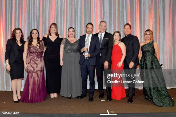 President and Chief Executive Officer Michael O'Neill and BMI Vice President of Latin Music Delia Orjuela present the Publisher of the Year Award to...