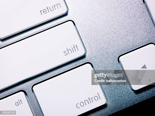 close up of shift key on computer keyboard. - shift key stock pictures, royalty-free photos & images