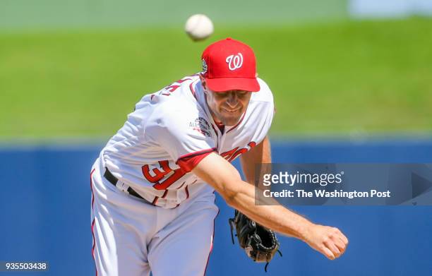 Washington Nationals pitcher Max Scherzer pitches against the Atlanta Braves during spring training action at The Ball Park of the Palm Beaches.